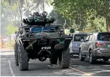  ??  ?? An armoured personnel carrier belonging to government troops heads to reinforce Marawi city.