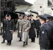  ?? ?? Adolf Hitler conducts a crew inspection onboard Bismarck, 5 May 1941. Captain Ernst Lindemann is second left with Admiral Lutjens directly behind Hitler