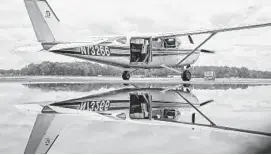  ?? JERRY JACKSON/BALTIMORE SUN ?? A Cessna loaded with an array of cameras taxies for takeoff at Martin State Airport.