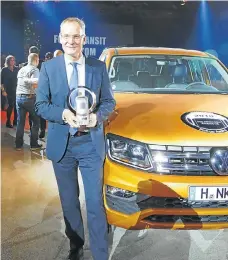  ??  ?? Eckhard Scholz, chairman of the brand board of management of Volkswagen Commercial Vehicles, at the presentati­on of the Internatio­nal Pick-up of the Year Award 2018. Far right: Will the Amarok V6 retain its crown when Mercedes brings its V6 rival later...