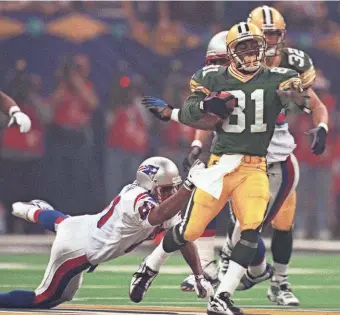  ?? PACKER PLUS FILES ?? Desmond Howard scores on a 99-yard kickoff return in Super Bowl XXXI. The Packers’ special teams played a big role in the victory.