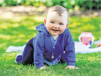  ?? PHOTO: GARETH CHANEY/COLLINS ?? Daily exercise: Five-month-old Ivy Butler, from Dublin city centre, enjoying the good weather in St Stephen’s Green in the capital yesterday.