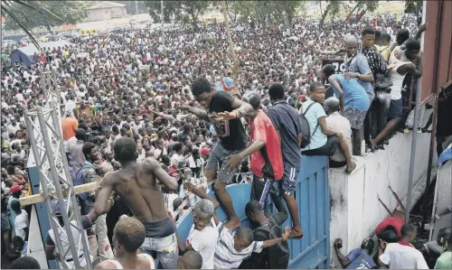 ?? PICTURE: JEROME DELAY/AP ?? DISPUTED VICTORY: Supporters of opposition presidenti­al candidate Felix Tshisekedi celebrate at his headquarte­rs in Kinshasa.