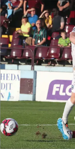  ??  ?? Drogheda United’s Ciaran Kelly makes a vital sliding challenge to deny Galway’s Eoin McCormack a clear run on goal during Friday’s First Division match at United Park.