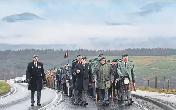  ?? Picture: Getty Images. ?? Both serving and former commandos march during the Commando Memorial Service in Spean Bridge yesterday. The event remembers the sacrifice of service men and women who fought in the First and Second World Wars and subsequent conflicts.