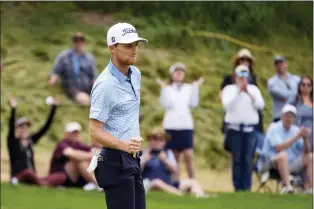  ?? CHARLES KRUPA — THE ASSOCIATED PRESS ?? Will Zalatoris reacts after making a birdie on the fourth hole during the third round of the U.S. Open golf tournament at The Country Club, Saturday, June 18, 2022, in Brookline, Mass.