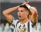  ?? — AP ?? Juventus’ Cristiano Ronaldo reacts during the Champions League Round of 16 second leg match against Lyon in Turin on Friday.