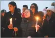  ?? Tyler Sizemore / Hearst Connecticu­t Media ?? Friends and family grieve for homicide victim Valerie Reyes during a candleight vigil in her honor at Glen Island Park in New Rochelle, N.Y. on Feb. 7.