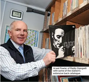  ?? ?? Arwel Fowler of Radio Glangwili with some of the station’s extensive back catalogue.