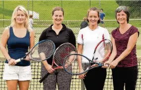  ??  ?? Smashing effort Lee Dunnachie and Aileen Morris, right, beat Emma Hodge and Nicole Whyte in the ladies’ doubles final