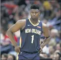  ?? RUSTY COSTANZA — THE ASSOCIATED PRESS FILE ?? In this March 6, 2020, file photo, New Orleans Pelicans forward Zion Williamson walks onto the court during the second half of the team’s NBA basketball game against the Miami Heat in New Orleans.