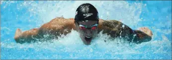  ?? Getty Images/tns ?? Caeleb Dressel competes at the FINA World Championsh­ips in Gwangju, South Korea. Silver medalist Caeleb Dressel of the United States celebrates during the medal ceremony for the Men’s 4x100m Medley Relay during the FINA World Championsh­ips at Nambu Internatio­nal Aquatics Centre in Gwangju, South Korea, on July 28.