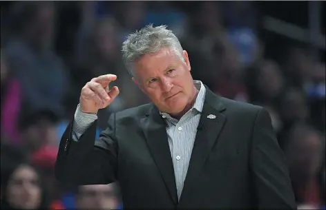  ?? MARK J. TERRILL — THE ASSOCIATED PRESS ?? Brett Brown, seen in a March 1game against the Clippers, is hopeful that the work his club has done during its yearslong process will pay off when the NBA season resumes.