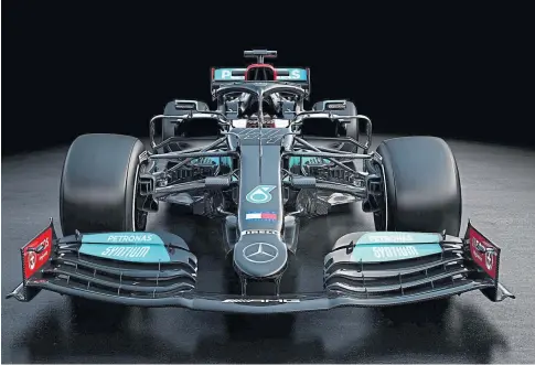  ??  ?? NEW CAR: Mercedes have updated their anti-racism black paint job as they eye a remarkable eighth F1 double.