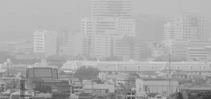  ?? AP ?? A thick layer of smog covers central Bangkok, Thailand, on Monday, sending air pollution levels soaring to 89 micrograms per cubic metre of PM2.5 particles in some areas, according to the Pollution Control Department.