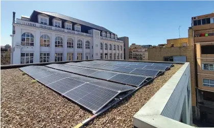  ?? ?? The solar panels on the roof of Quatre Cantons secondary school supply power to the school and 30 surroundin­g households. Photograph: IES Quatre Cantons