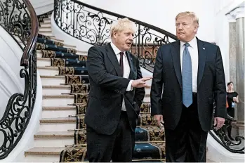  ?? ERIN SCHAFF/AP ?? President Trump and Britain’s Prime Minister Boris Johnson, left, speak to the media before a working breakfast meeting