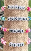  ?? ?? Among the most popular items Marlana Penney makes are her custom song lyric embroidery hoops. Recently, she started making custom name bracelets and those have been a hit as well.