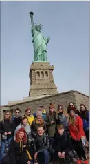  ?? Photo submitted to The McLeod River Post ?? The Holy Redeemer Travel Club took a big bite out of the Big Apple during spring break as they toured the City that Never Sleeps. Fourteen grade 10 to 12 students went to four Broadway shows and saw all the major sites in New York City including the...