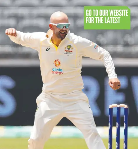  ?? Picture: Getty ?? Australian spinner Nathan Lyon celebrates after taking the wicket of Kraigg Braithwait­e in Perth.