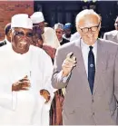  ??  ?? Kirk-greene in 2004 with the former vice president of Nigeria, Atiku Abubakar