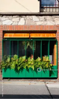  ??  ?? This garage conversion, by Taka Architects, involved replacing the garage doors with a planted screen, providing a window to servce the new kitchen that is now located in the converted space. Garage conversion­s can often be carried out under Permitted Developmen­t.