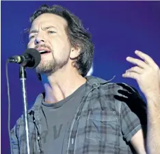  ?? ASSOCIATED PRESS FILE ?? Pearl Jam frontman Eddie Vedder took a moment to honour Gord Downie at his band’s concert on Saturday night.