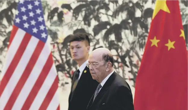  ?? PICTURE; GETTY IMAGES ?? 0 US Commerce Secretary Wilbur Ross arrives at Diaoyutai State Guesthouse for a meeting with Chinese Vice Premier Liu He in Beijing