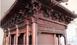  ?? ?? An intricate model of the Taihe Hall, crafted by Jiading carpenter Wang Haiming — Liu Xinyu