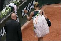  ?? CHRISTOPHE ENA — THE ASSOCIATED PRESS ?? Japan’s Naomi Osaka leaves after losing against Amanda Anisimova of the U.S. during their first round match at the French Open tennis tournament in Roland Garros stadium in Paris, France, Monday, May 23, 2022.