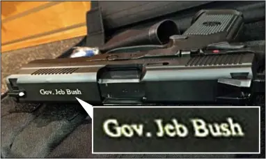  ??  ?? Deadly gift: The .45 calibre engraved handgun that was presented to Jeb Bush in South Carolina