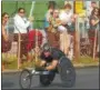  ?? KYLE MENNIG — ONEIDA DAILY
DISPATCH ?? Wheelchair riders near the Boilermake­r finish line on Sunday, July 12, 2015. This year’s Boilermake­r will take place Sunday, July 8, 2018.