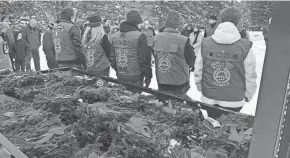  ?? SUBMITTED ?? These members of AMVETS Post 127 helped lay remembranc­e wreaths on the graves of 60 veterans at the Village of Ingram Cemetery.