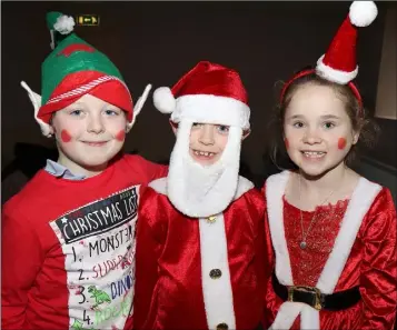  ??  ?? Luke Byrne, Adam Fitzpatric­k and Chloe Kelly Doyle pictured at the Castledock­rell NS Christmas Pageant in Castledock­rell Hall