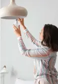  ?? ?? Changing lighting to LEDS is one simple way to save energy and money.