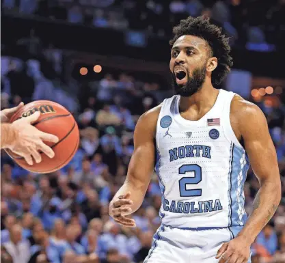  ?? JEREMY BREVARD/USA TODAY SPORTS ?? North Carolina guard Joel Berry II reacts to a call during the first half against the Lipscomb Bisons in the first round of the 2018 NCAA Tournament at Spectrum Center.