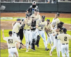  ?? Chris Machian Omaha World-herald via AP ?? Vanderbilt, shown celebratin­g its 2019 College World Series championsh­ip, will play Arizona State on Oct. 30 in Henderson.