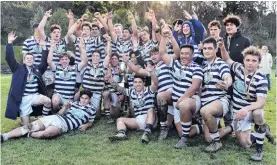  ?? PHOTO: PETER MCINTOSH ?? Grinners . . . The Otago Boys’ High School first XV is all smiles after winning on Saturday.