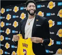  ?? Marcus Yam Los Angeles Times ?? DAVIS WAS thought of as a villain when he tried to force a trade during the season, but it’s all smiles now that he’s a Laker.
