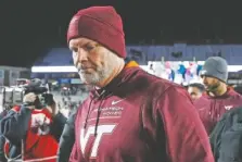  ?? AP PHOTO/MICHAEL DWYER ?? Virginia Tech head coach Justin Fuente walks off the field after losing to Boston College on Nov. 5.