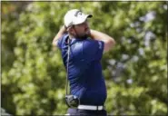  ?? NAM Y. HUH — THE ASSOCIATED PRESS ?? Marc Leishman watches his tee shot on the fourth hole during the second round of the BMW Championsh­ip on Friday.