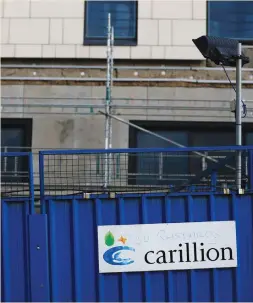  ?? (Phil Noble/Reuters) ?? A DEFACED SIGN is seen outside Carillion’s Royal Liverpool Hospital site in Liverpool, yesterday.