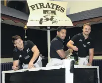  ?? PHOTO: LINDA ROBERTSON ?? Applying the paint . . . All Blacks Matt Todd, Te Toiroa Tahurioran­gi and Sam Cane (right) helped revamp the Pirates Rugby Club rooms, in Dunedin, yesterday during National Volunteer Week.