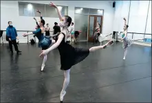  ?? PHOTOS BY GAO ERQIANG / CHINA DAILY ?? Some Shanghai Ballet dancers resume training following their 14-day quarantine as they’d returned from a US tour on Feb 1.