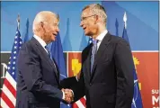  ?? SUSAN WALSH/AP ?? President Joe Biden greets NATO Secretary General Jens Stoltenber­g at the North Atlantic Treaty Organizati­on summit in Madrid, Spain, on Wednesday.