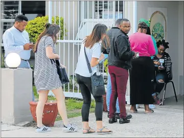  ?? Picture: WERNER HILLS ?? CIVIC DUTY: Residents of Ward 1 in Summerstra­nd wait in the queue to cast their vote during the by-election