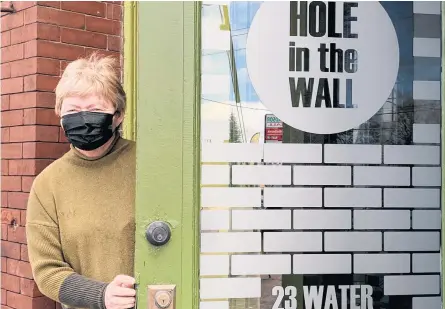  ?? CAROLE MORRIS-UNDERHILL PHOTOS ?? Debbie Dunham is excited to finally welcome patrons to Hole in the Wall, a new upscale dining establishm­ent on Water Street in Windsor.