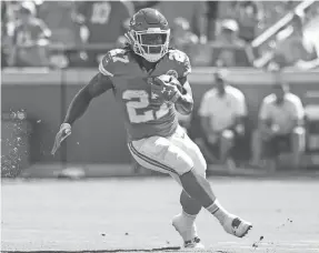  ?? JAY BIGGERSTAF­F/USA TODAY SPORTS ?? Running back Kareem Hunt rushed for 2,151 yards and 15 TDs in 27 games for the Chiefs before he was suspended.