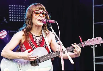  ?? AMY HARRIS / INVISION / AP FILES ?? Jenny Lewis performs at the Forecastle Music Festival in Louisville, Ky. in July.