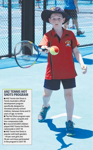  ??  ?? FOCUSED: Brody Meager, 9, keeps his eyes on the ball during the Hot Shots Red Ball Gala Day.